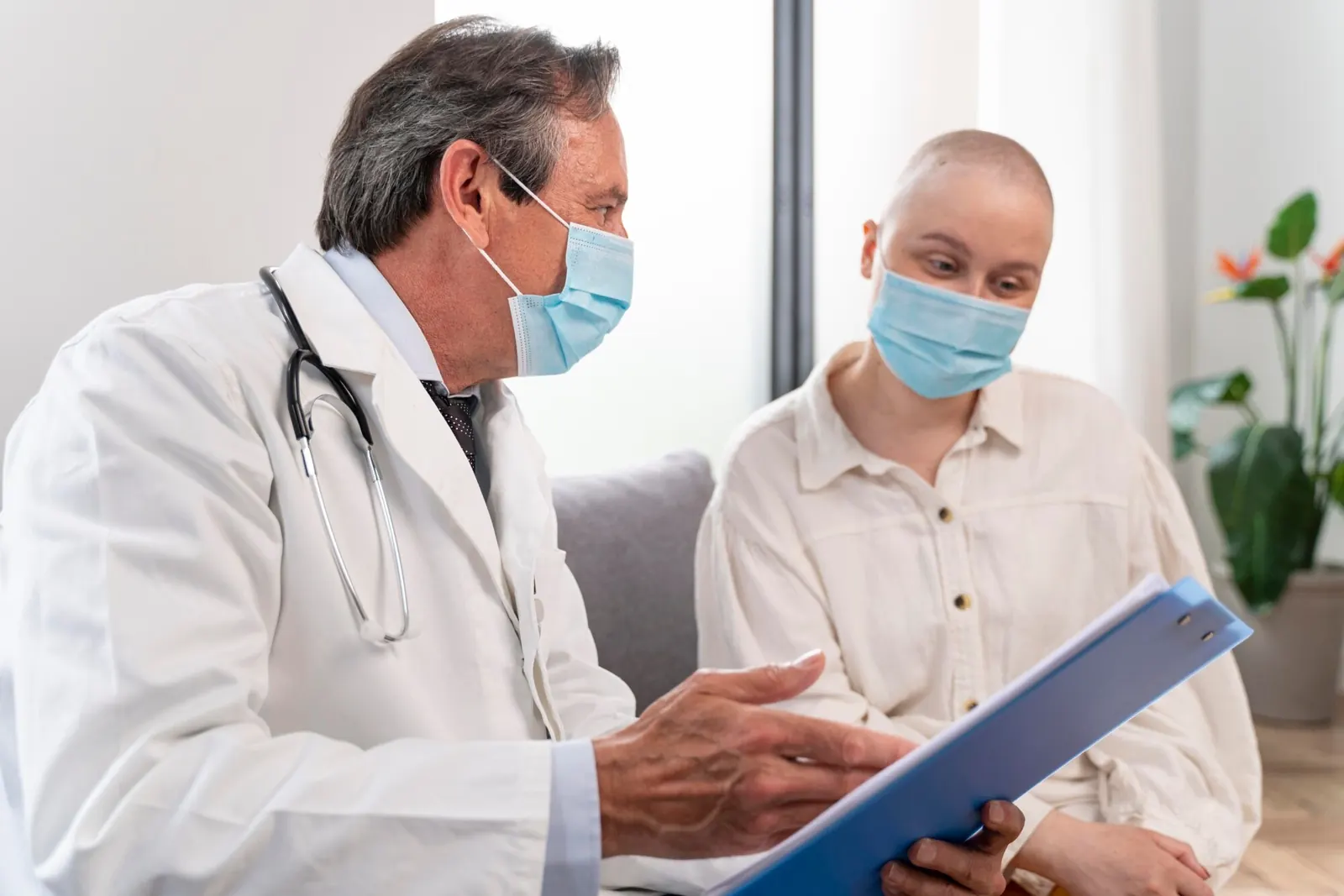 Doctor speaking with a patient during cancer treatment